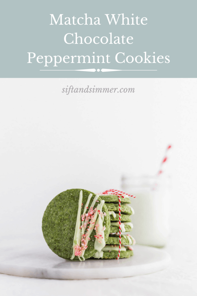 Matcha White Chocolate Peppermint Cookies on marble board with glass of milk with red straw in background, with text overlay.