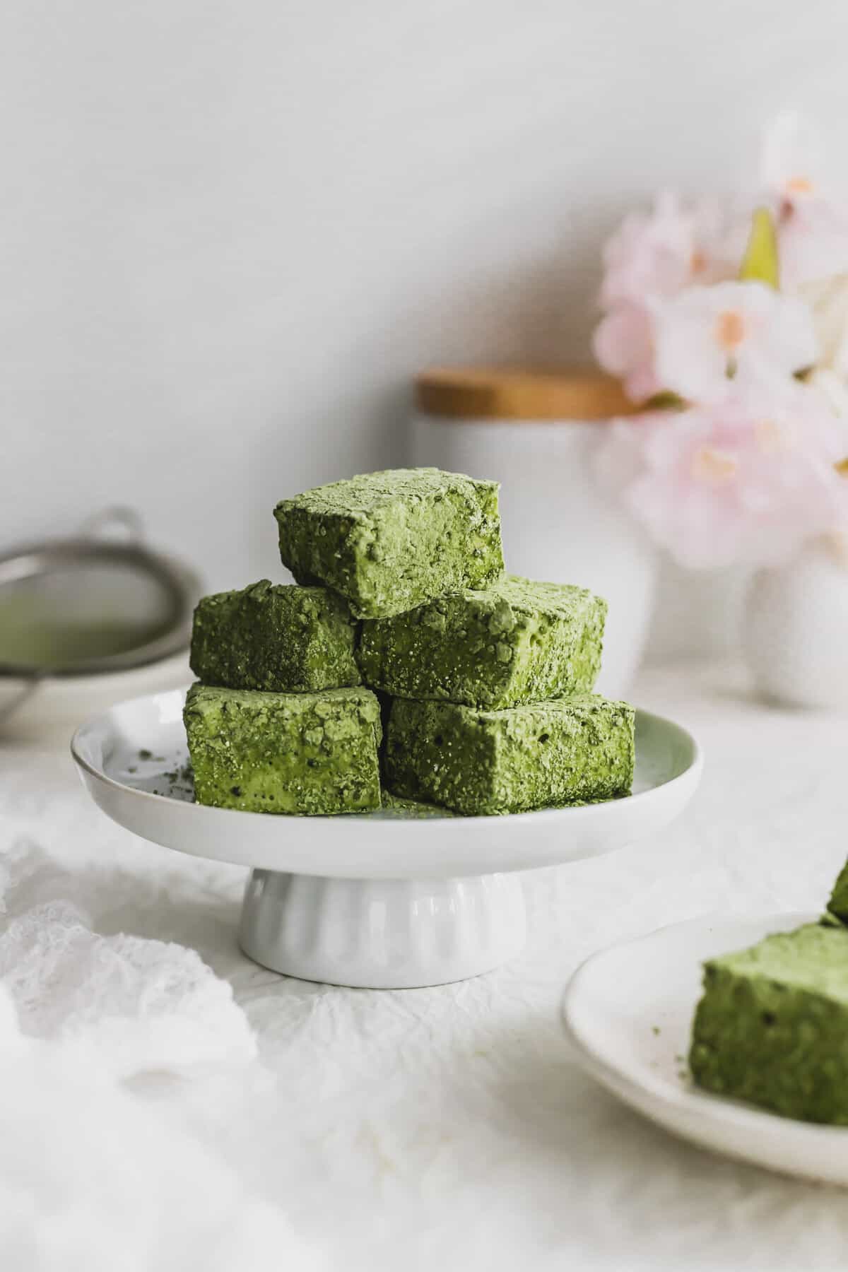 Cut Matcha marshmallows on a mini pedestal.