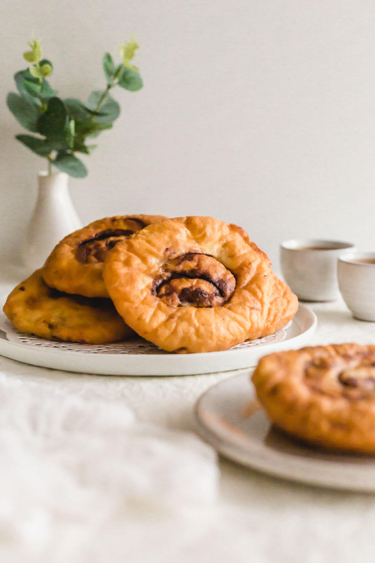 Fried ham chim peng on a white plate.