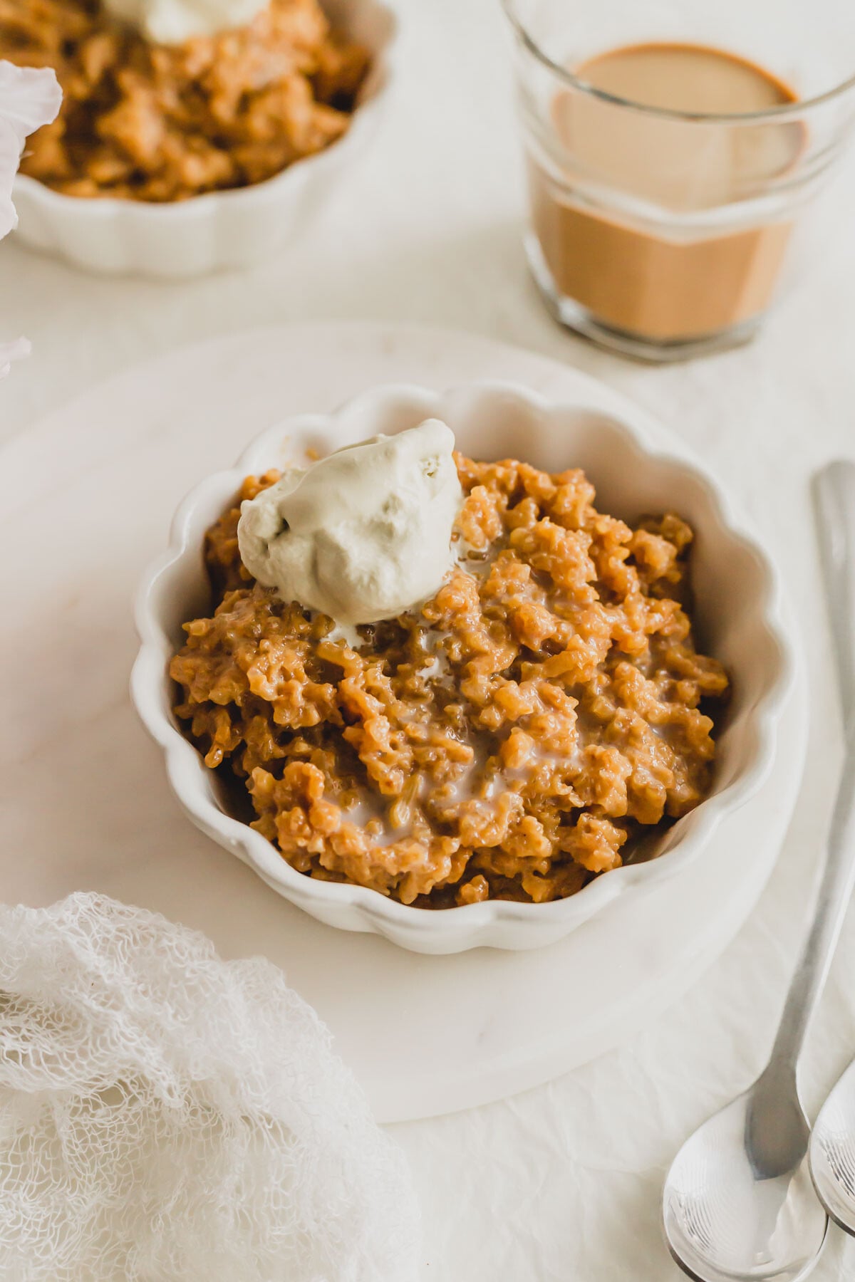 Hong Kong milk tea rice pudding in a white ramekin.
