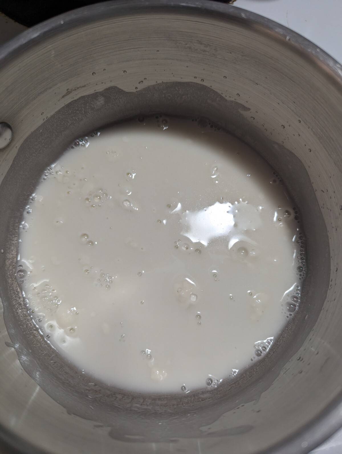 Flour and water in a pan mixed together for making tangzhong.