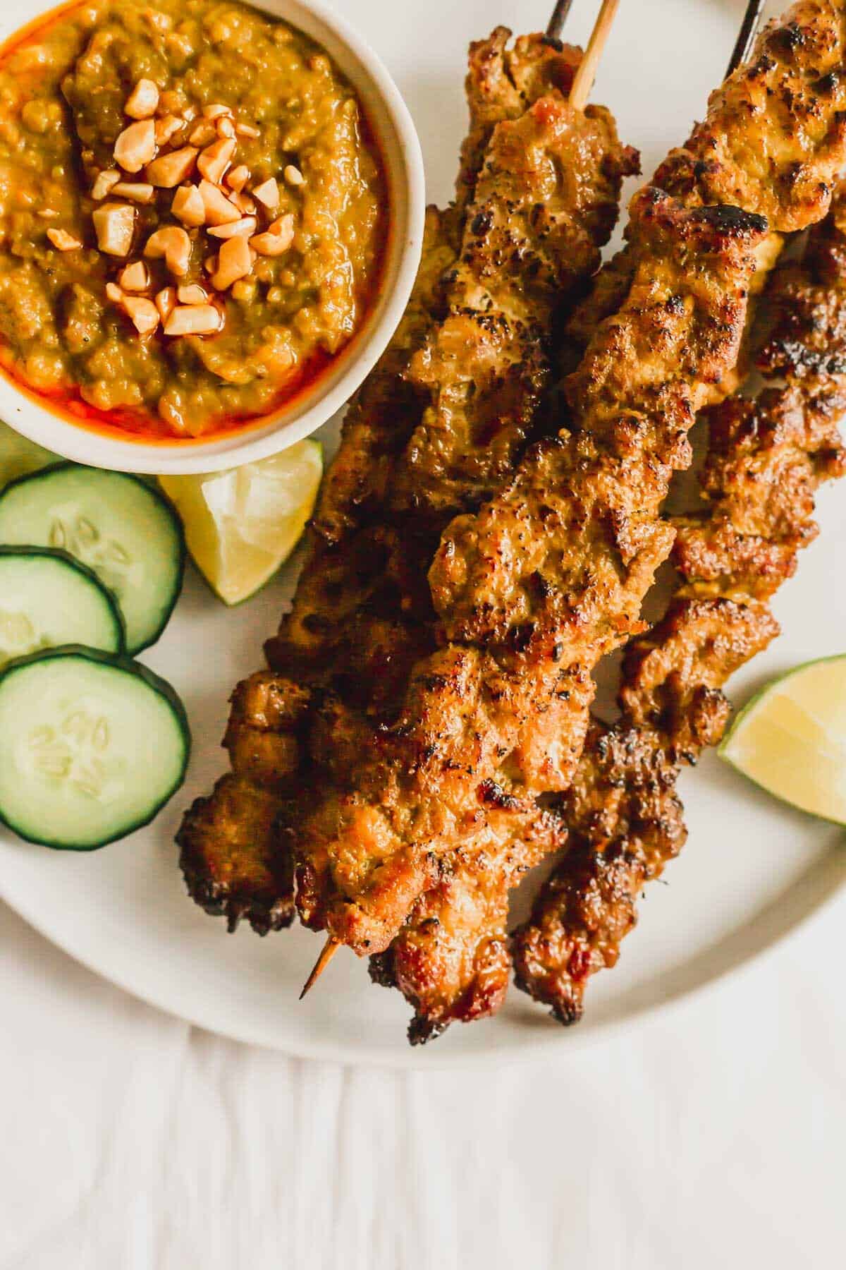 Close up of Malaysian pork satay skewers.