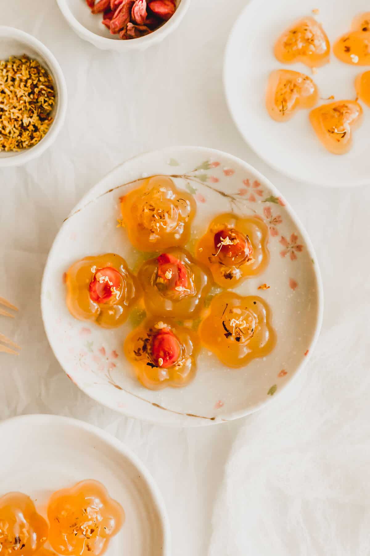 Osmanthus flower jellies on small plates.