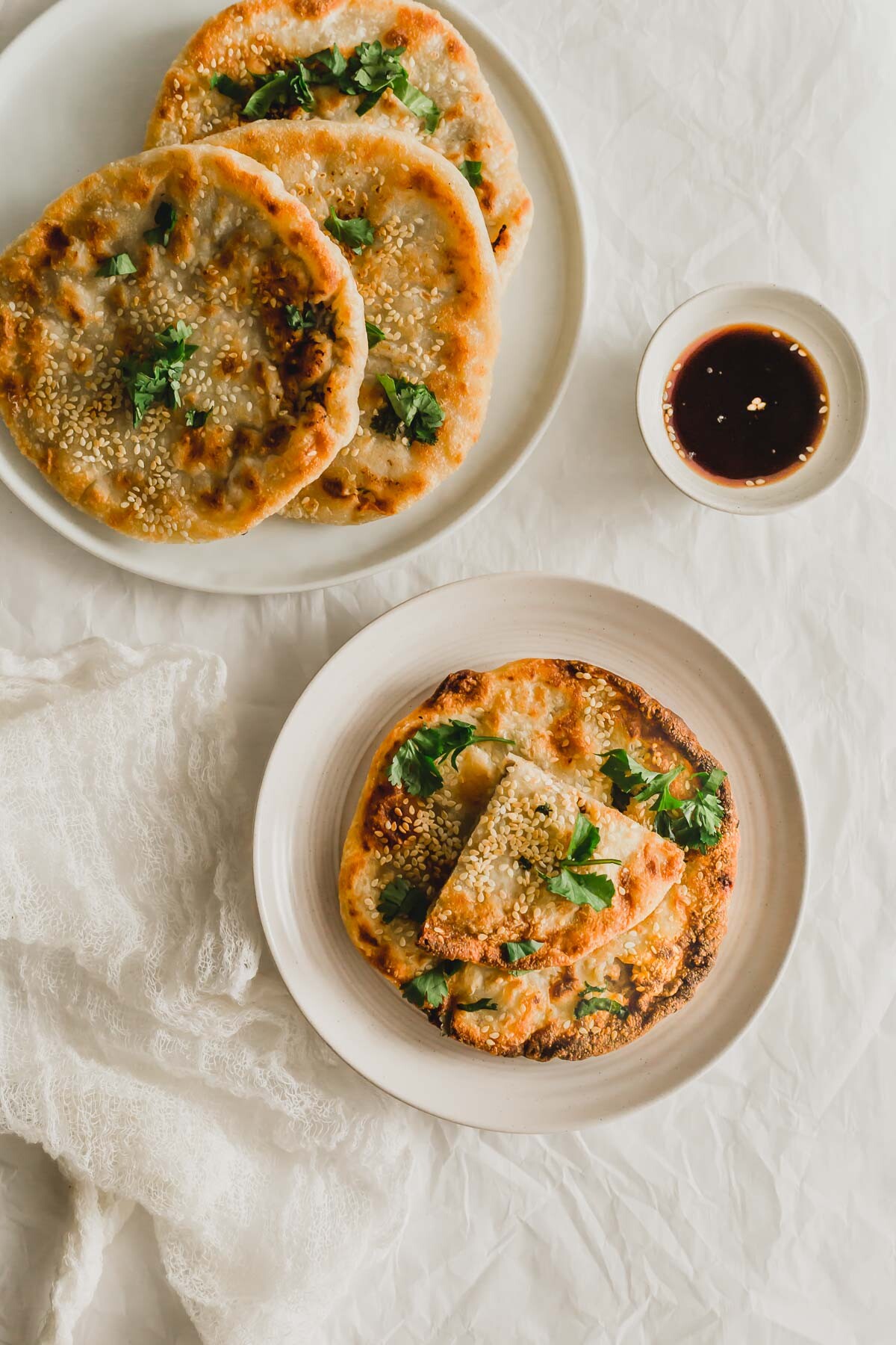 Crispy Chinese beef pancakes on plates.