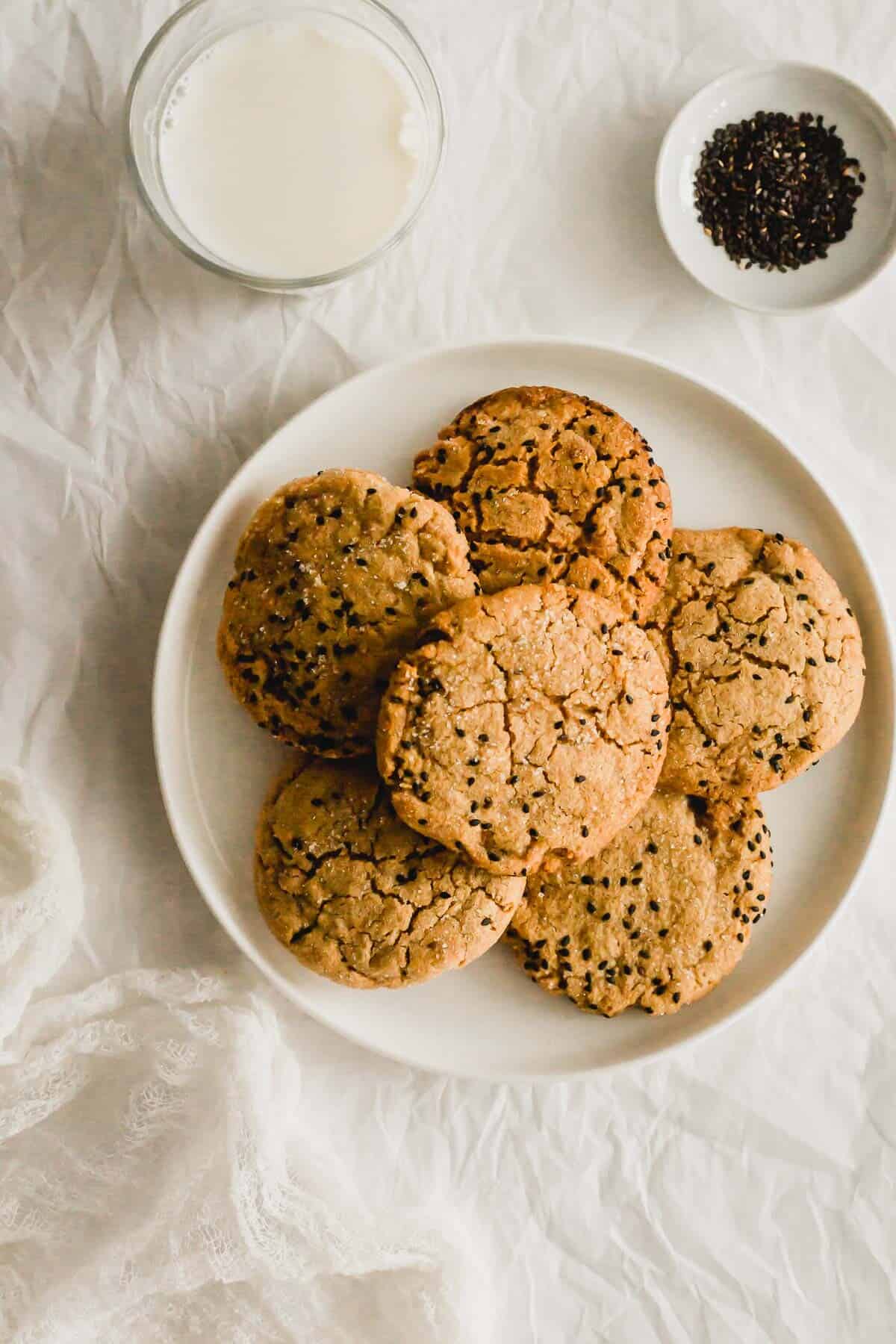 Tahini miso cookies on white plate.