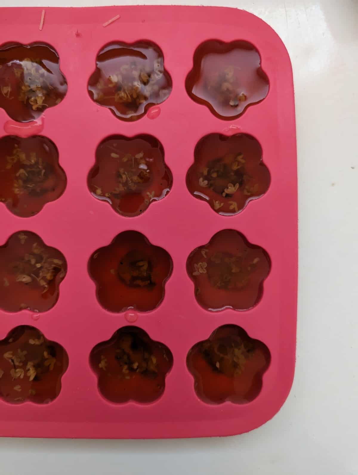 Pouring the mixture into molds.