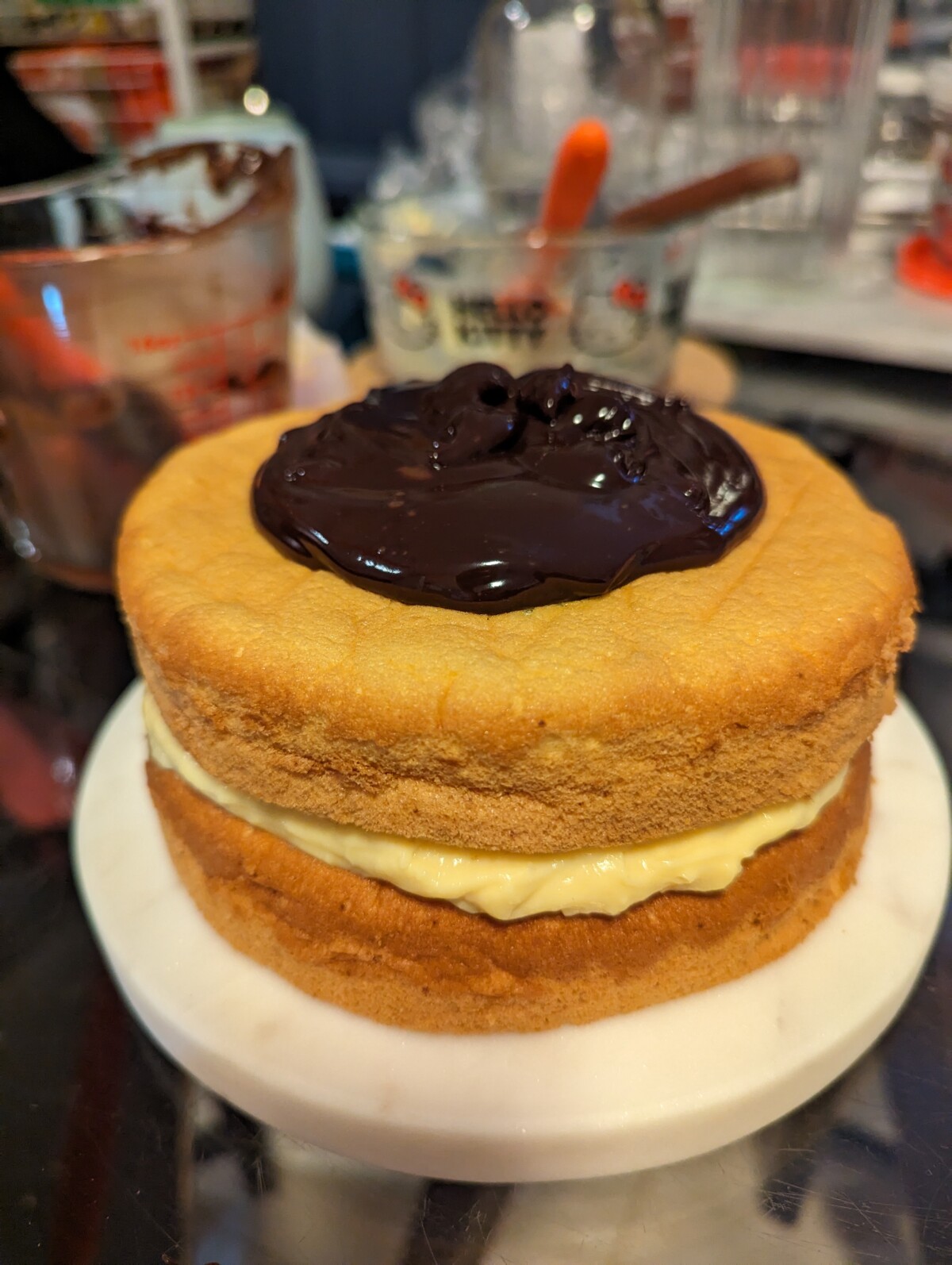 Ganache on top of the cake.