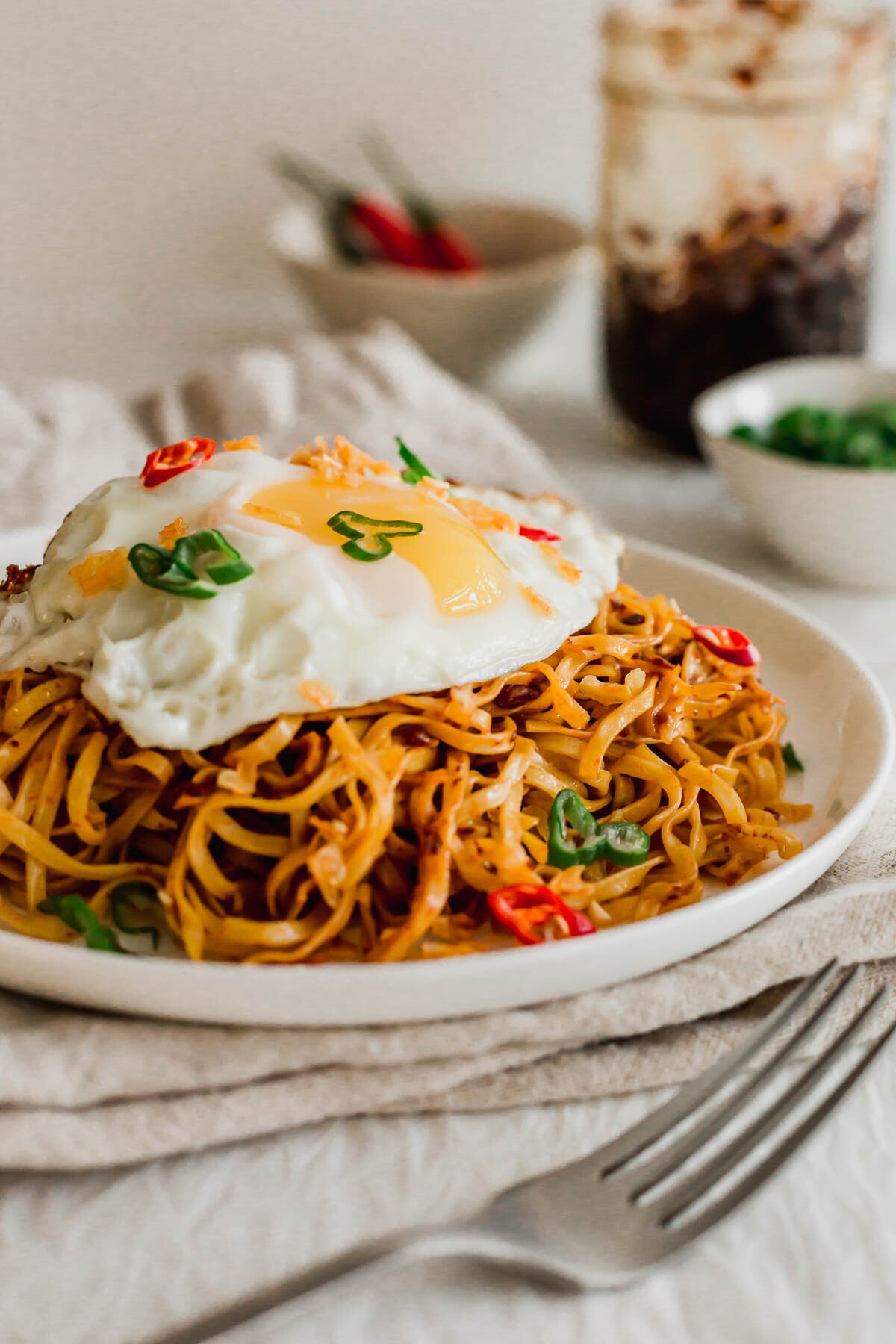 Mee goreng noodles on a white plate.