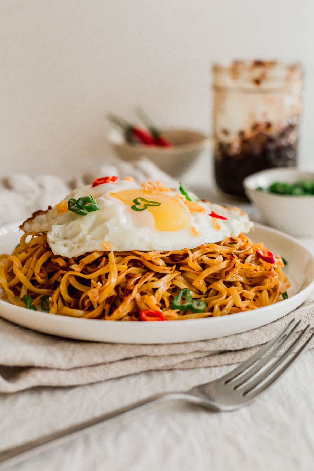 Mee goreng noodles on a white plate.