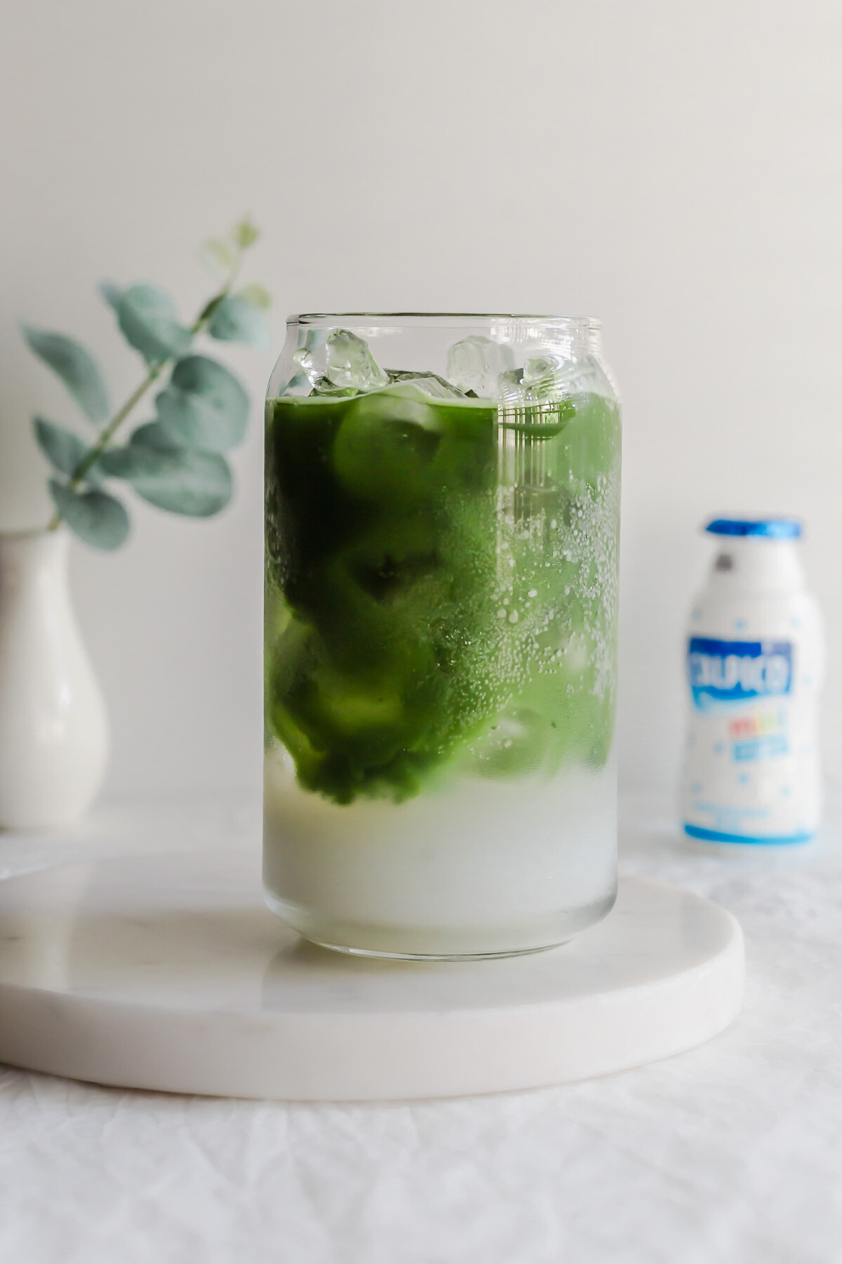 Matcha Calpis in a glass.
