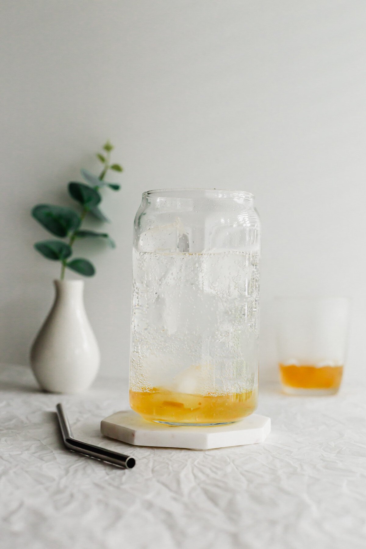 Iced sparkling yuzu in a glass.