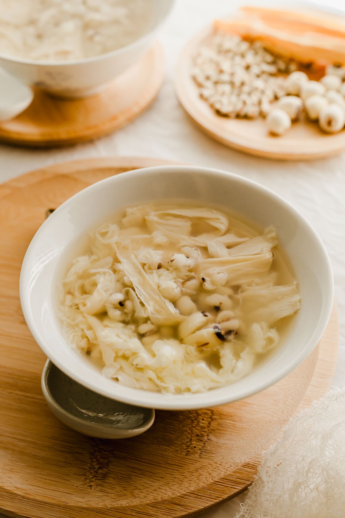Chinese Job's tears dessert soup in a white bowl.