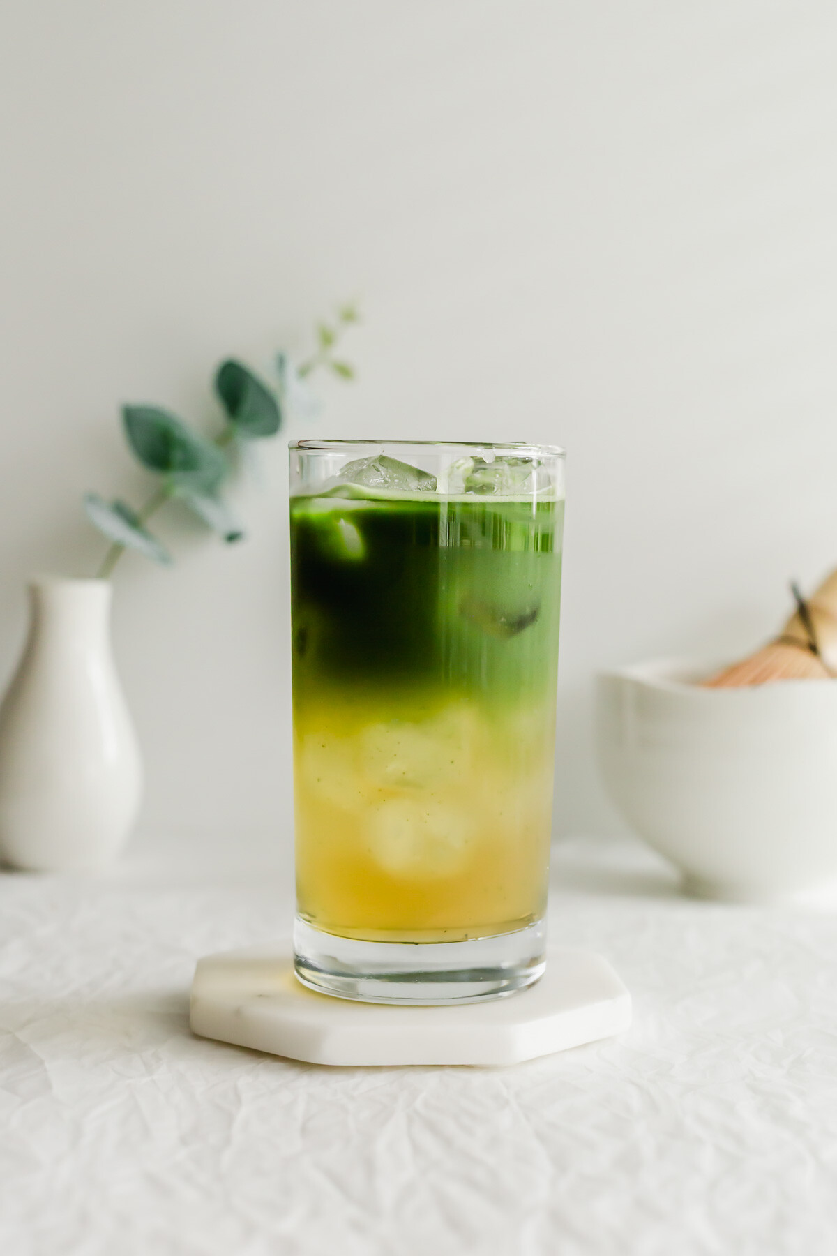 A glass of matcha jasmine tea.