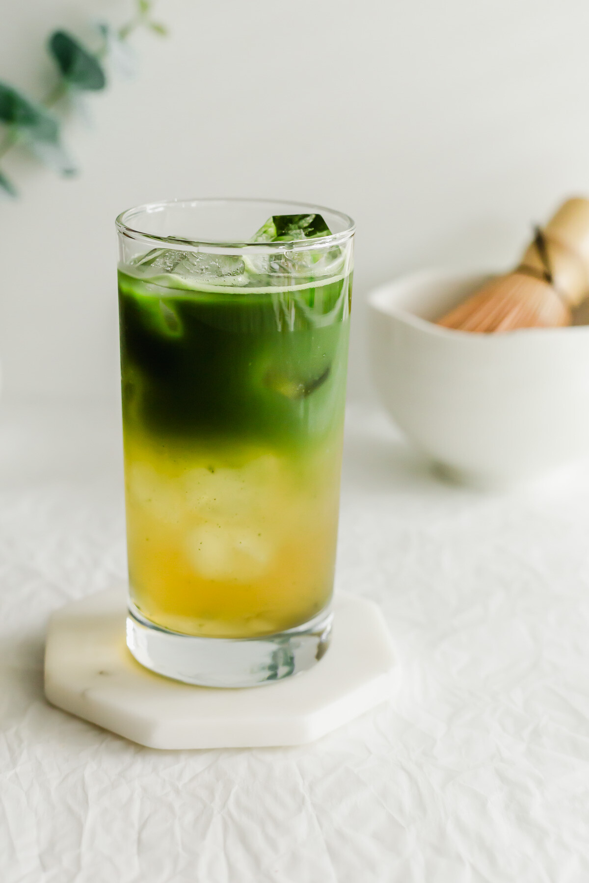 A glass of matcha jasmine tea.
