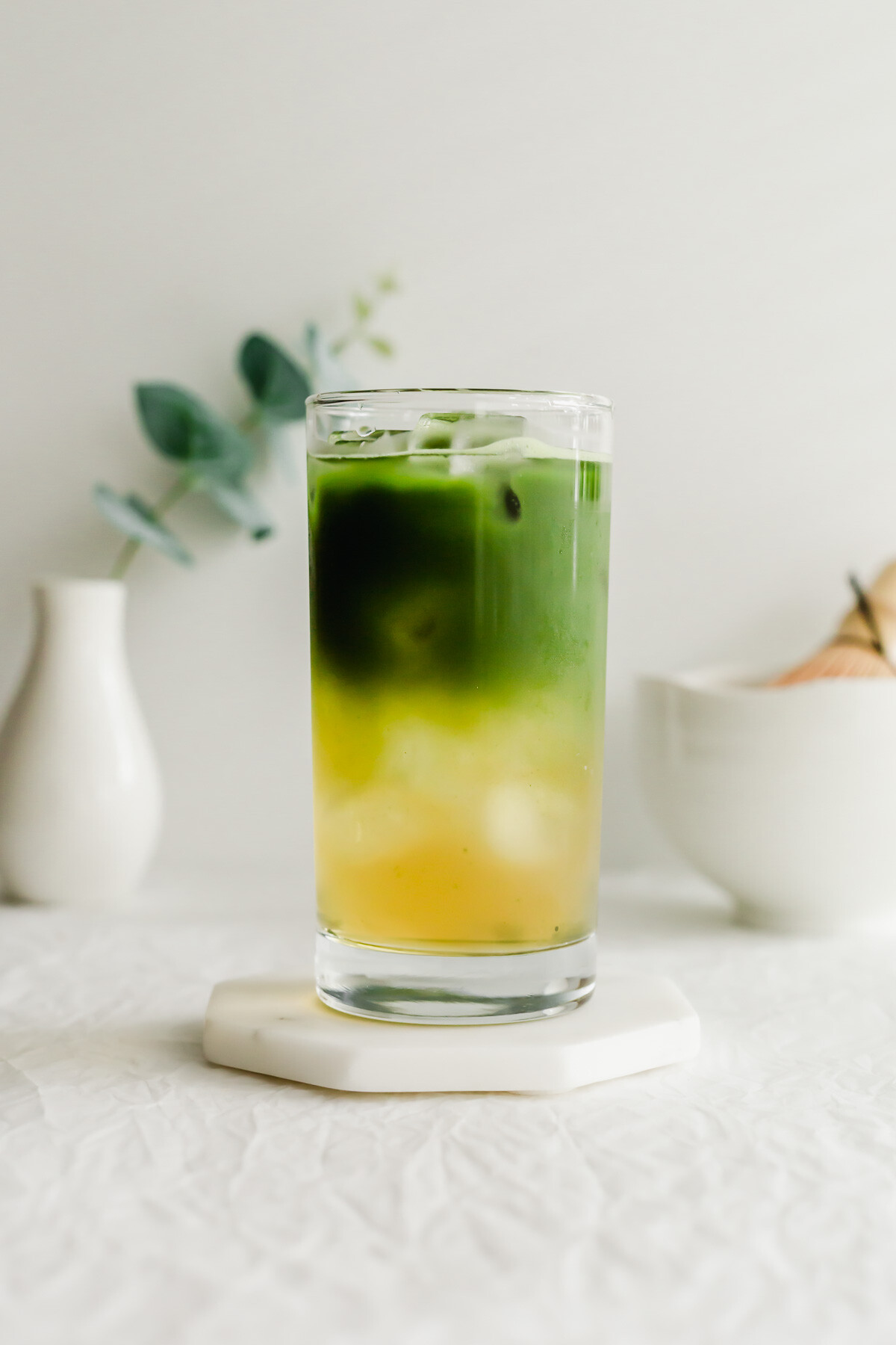 A glass of matcha jasmine tea.