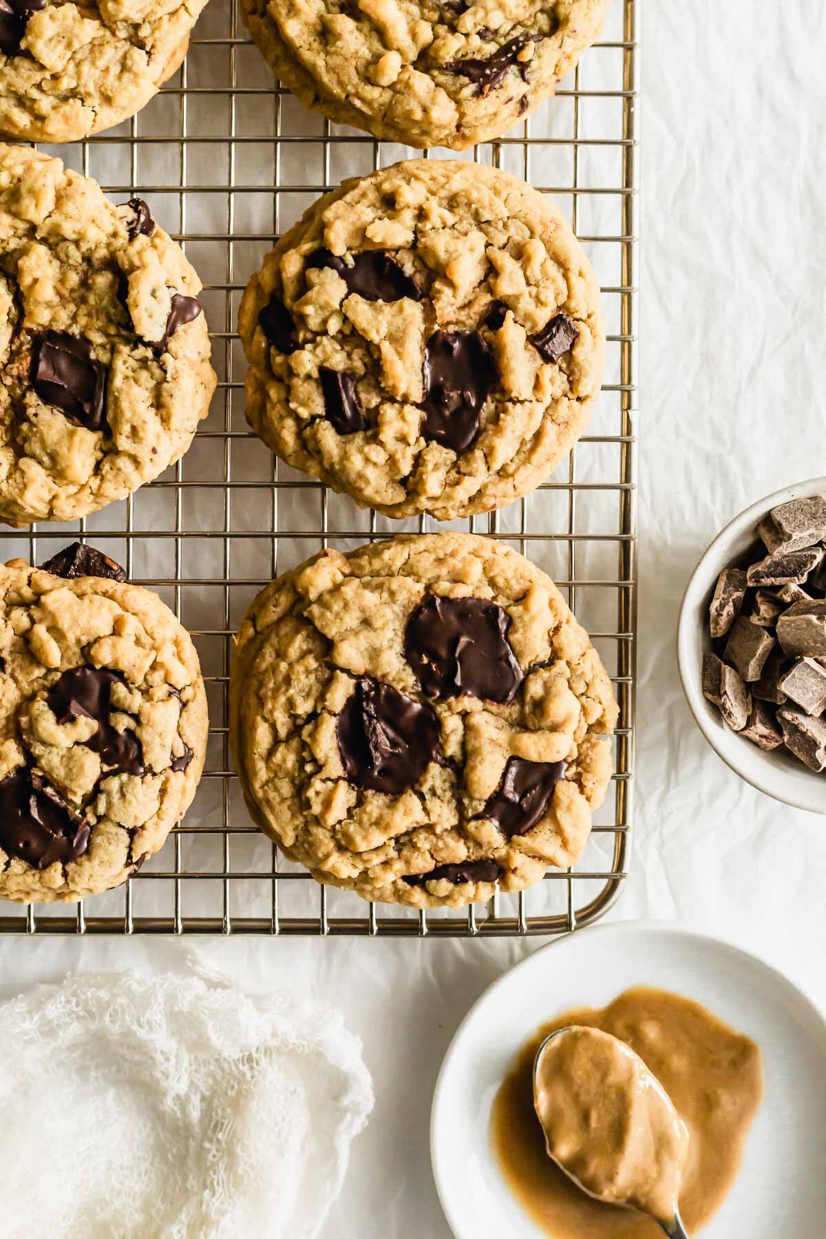Chocolate tahini cookies on a wire rack.
