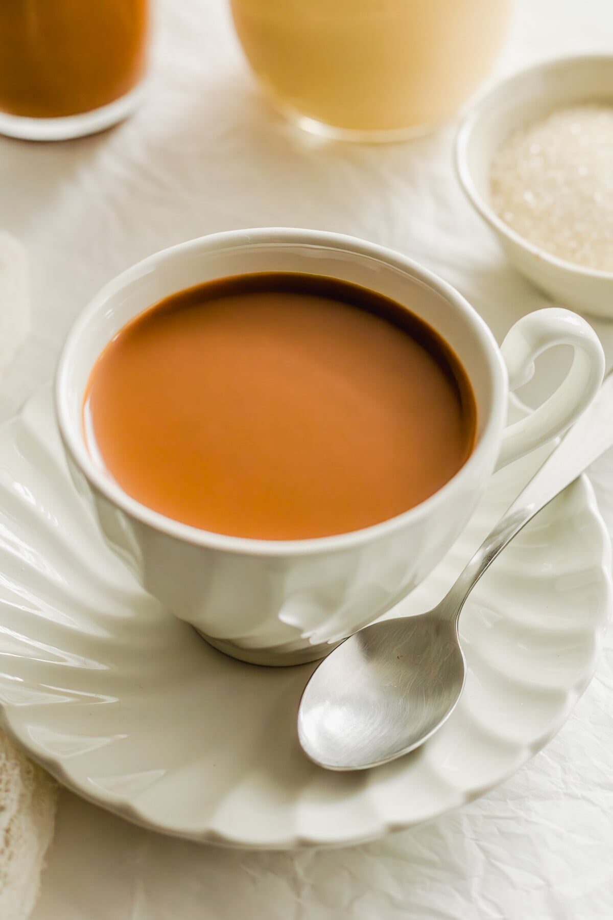 Hong Kong milk tea in a white tea cup.