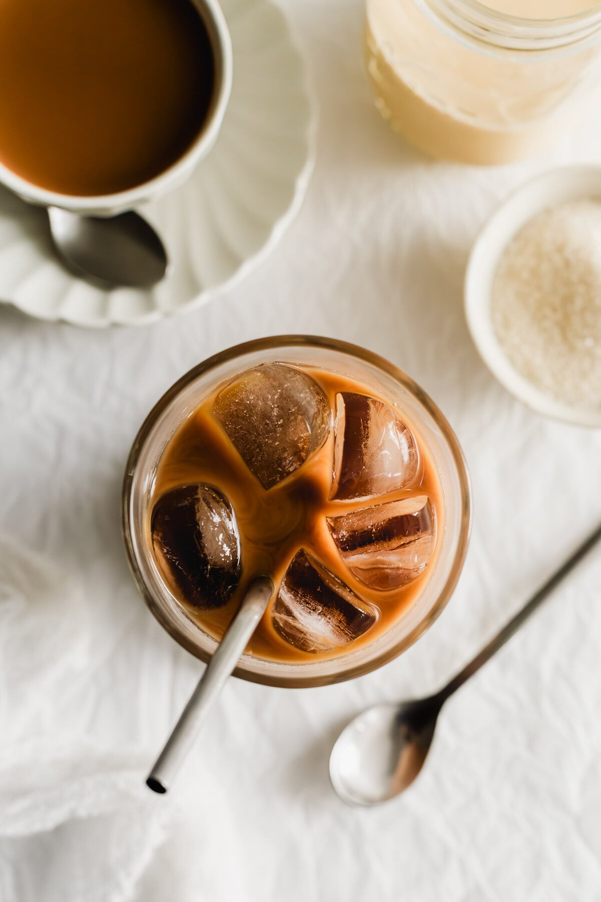 Iced Hong Kong milk tea in a glass with straw. 