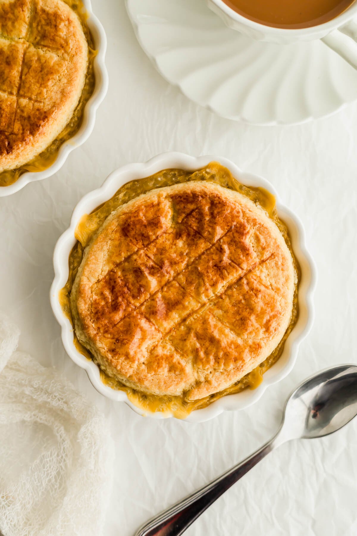 Baked tapioca pudding in a white ramekin.