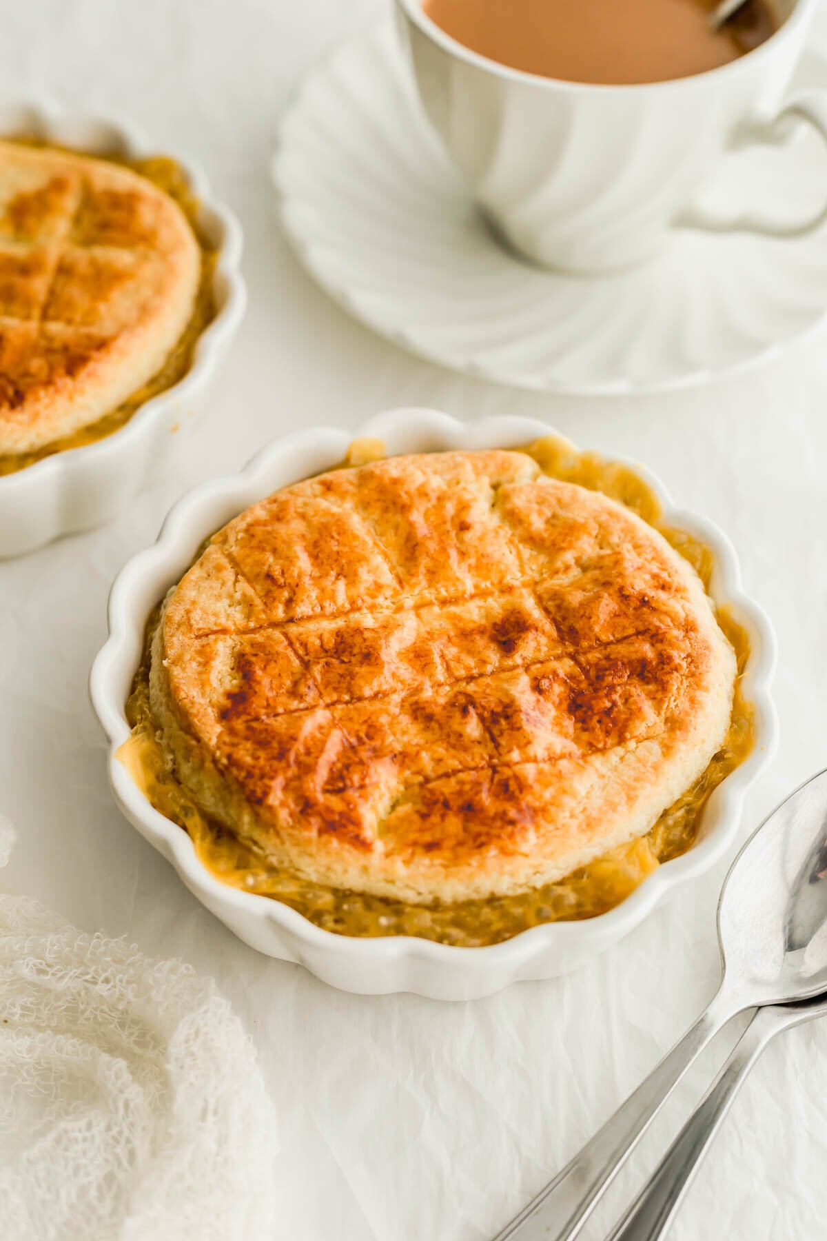 Baked tapioca pudding in a white ramekin.