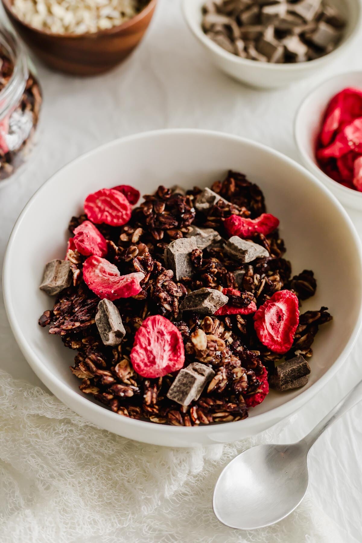 White bowl filled with love crunch granola.