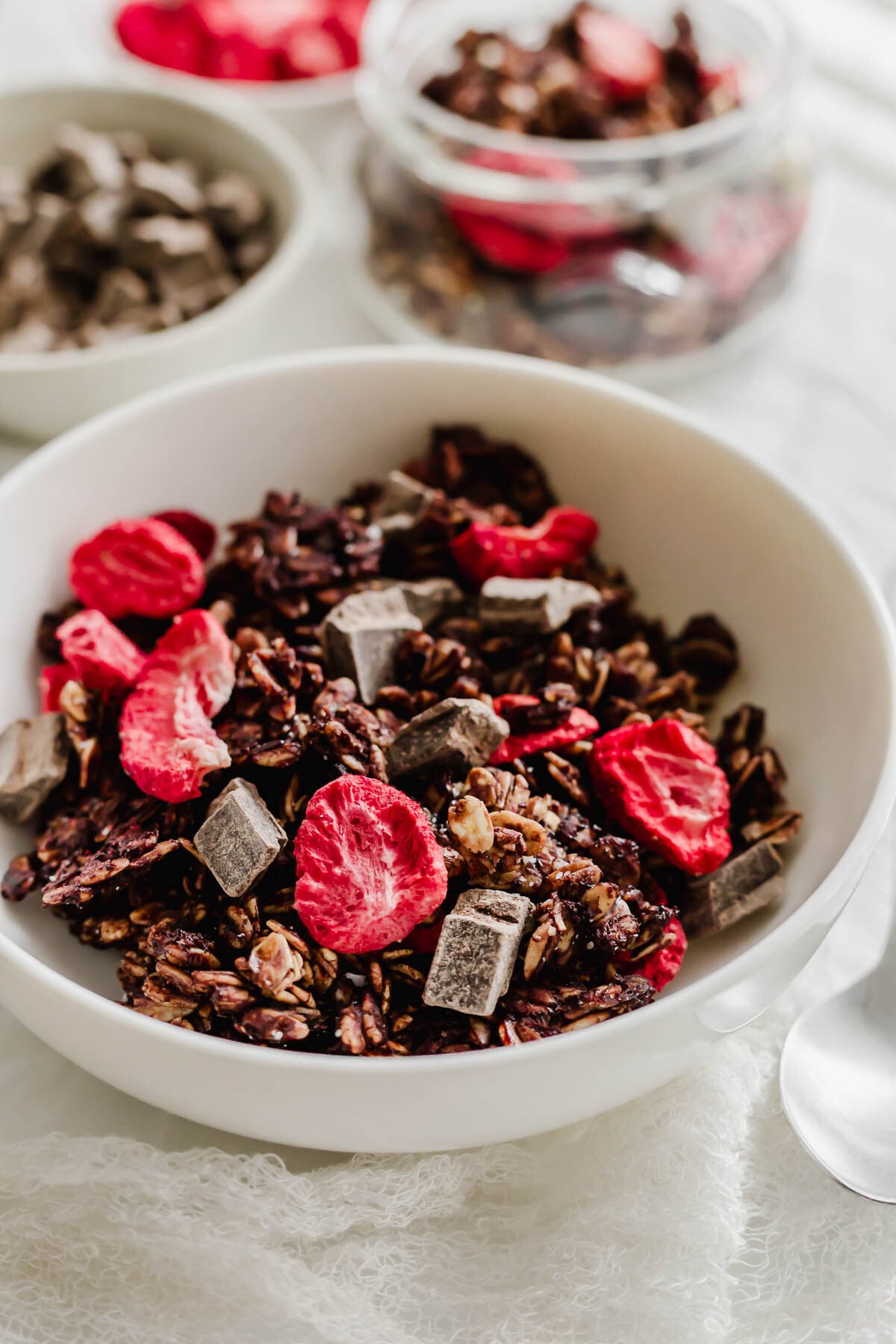 White bowl filled with love crunch granola.